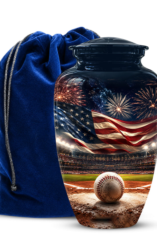 Cremation urn with American flag and baseball field design, accompanied by a blue drawstring bag.